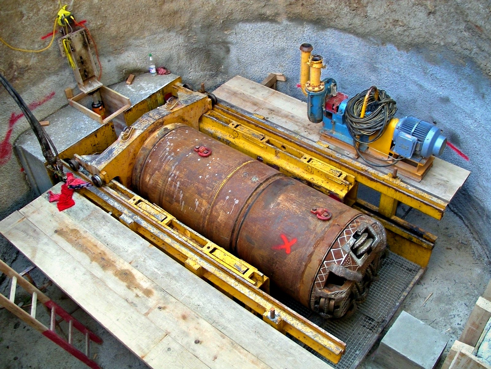 Microtunnel boring machine on the jacking frame in a launch shaft