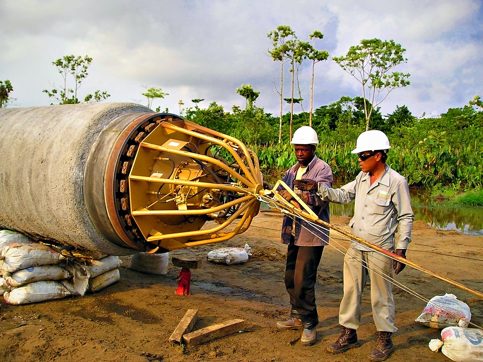 Crew in full PPE preparing a pipeline pig