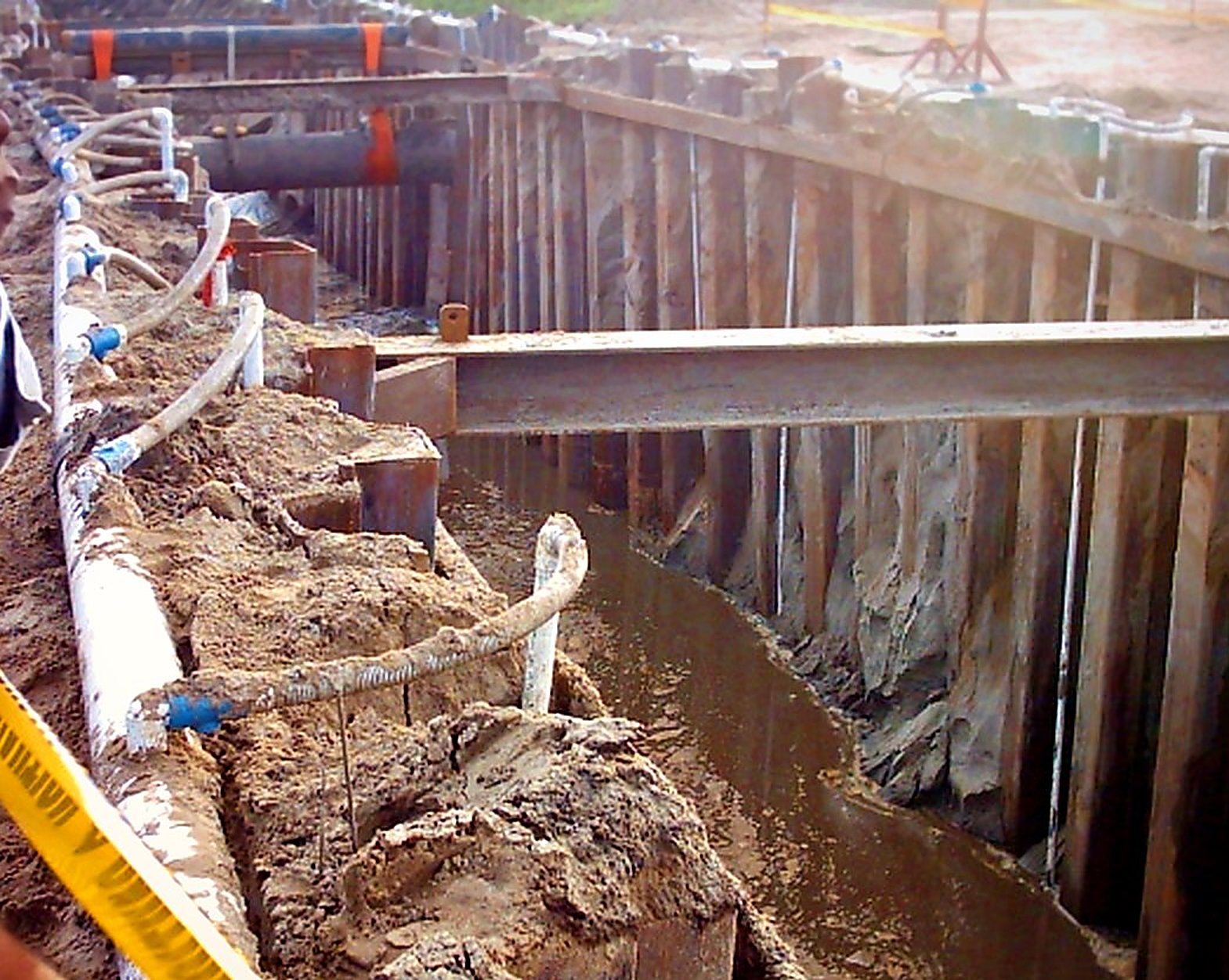 Sheet-piled crossing excavation with walers and wellpoint dewatering