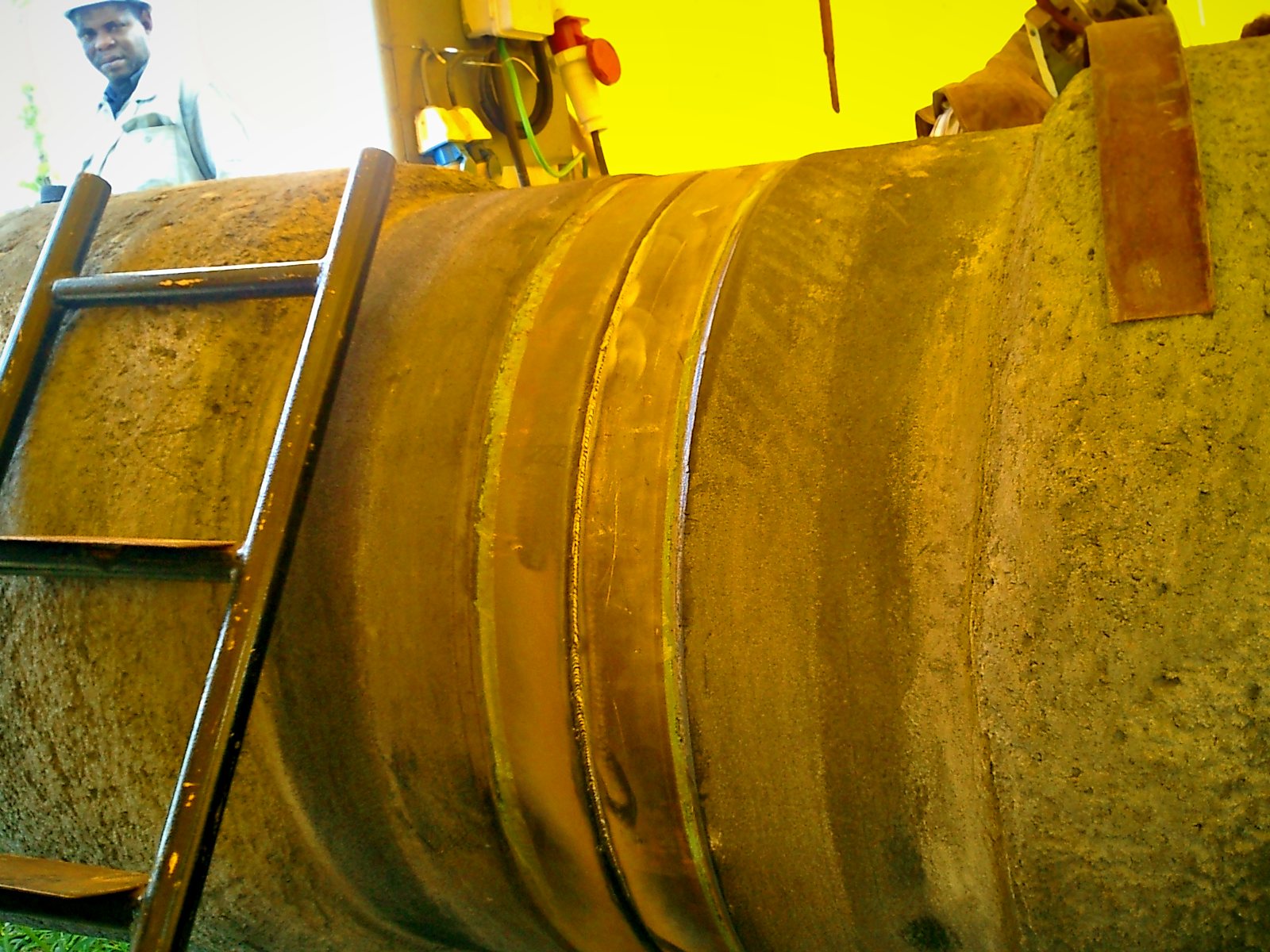 Completed girth weld on large-diameter pipe
