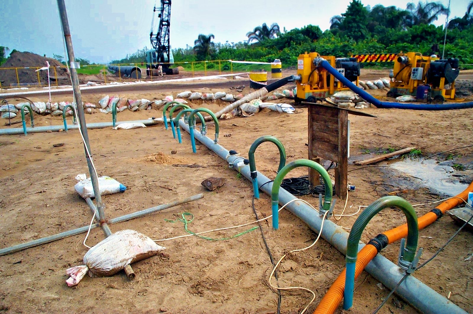 Wellpoint dewatering system along the trench